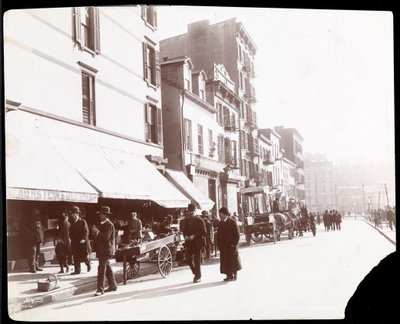 View of street vendors selling fruit, New York, 1898 by Byron Company